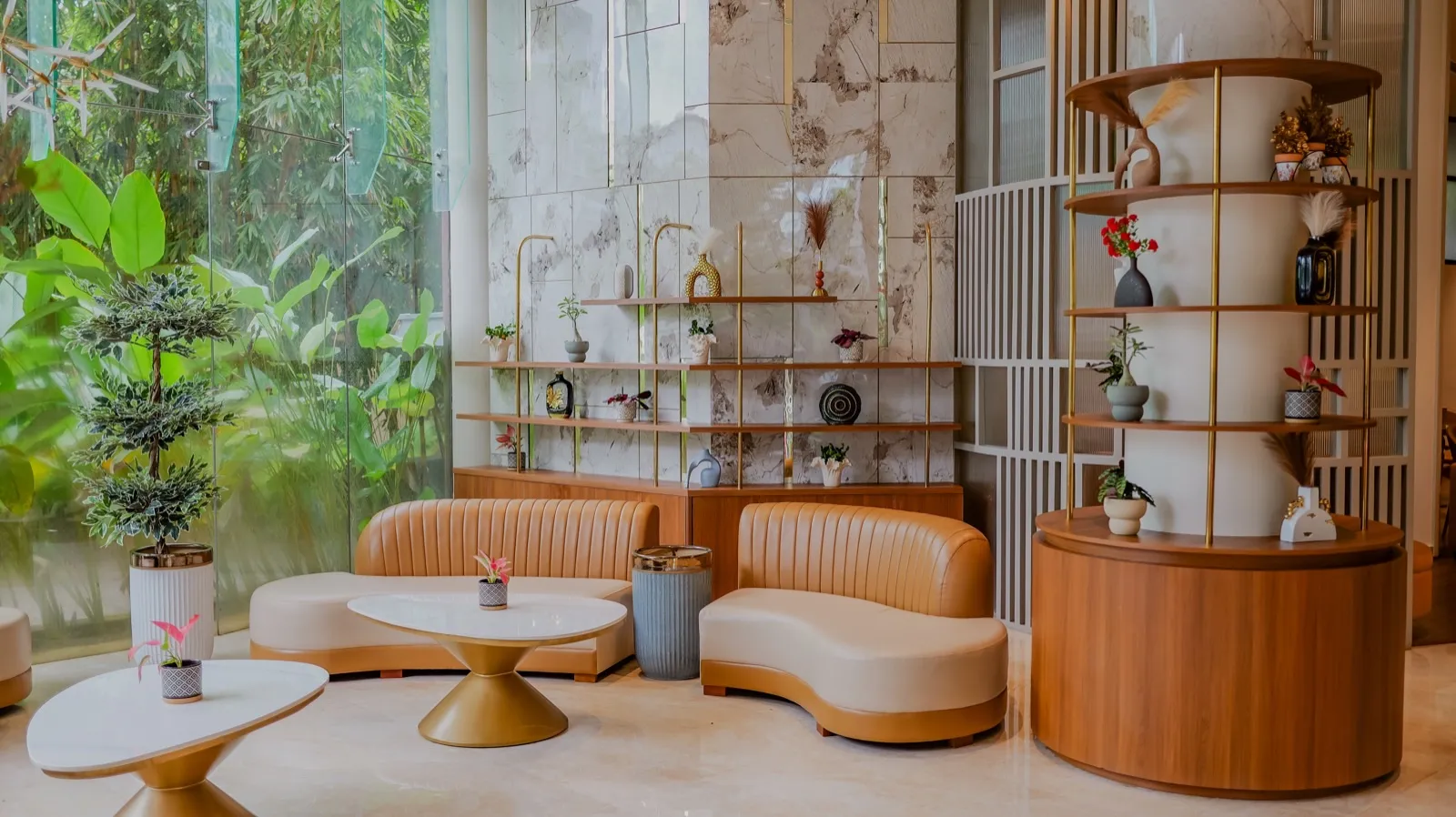 Hotel Explora Calicut lounge seating with garden view in Kozhikode