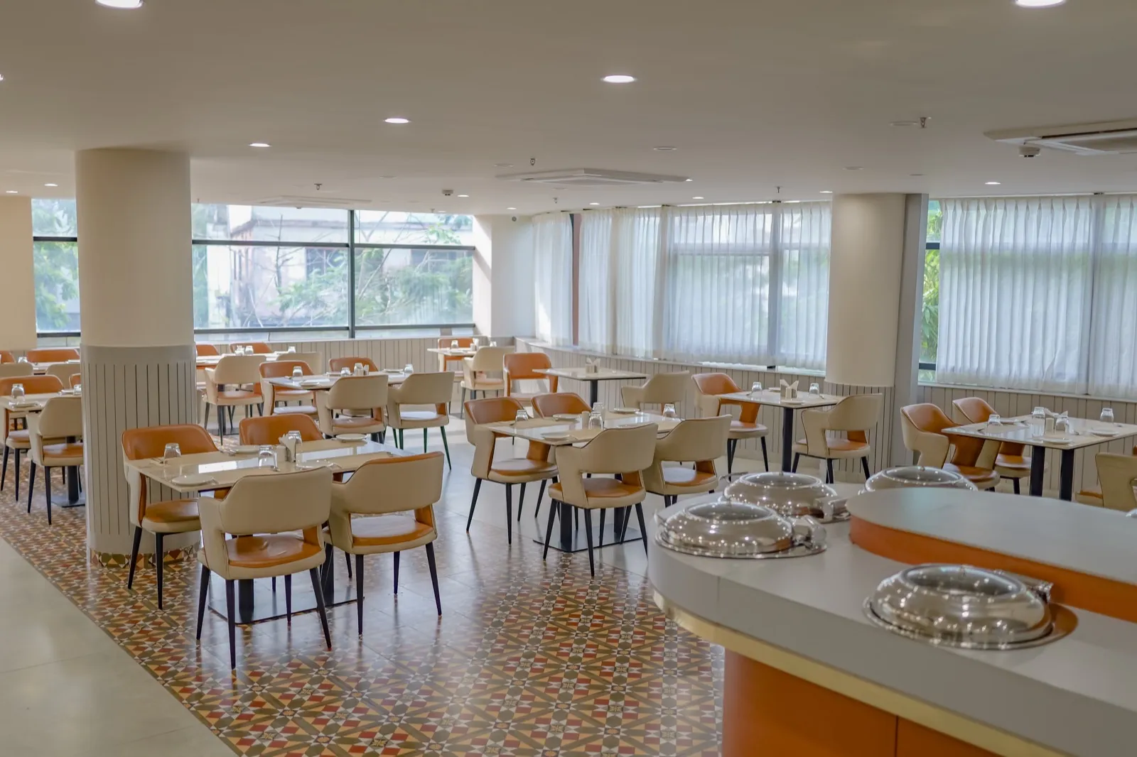 Premium restaurant seating at Hotel Explora Kozhikode