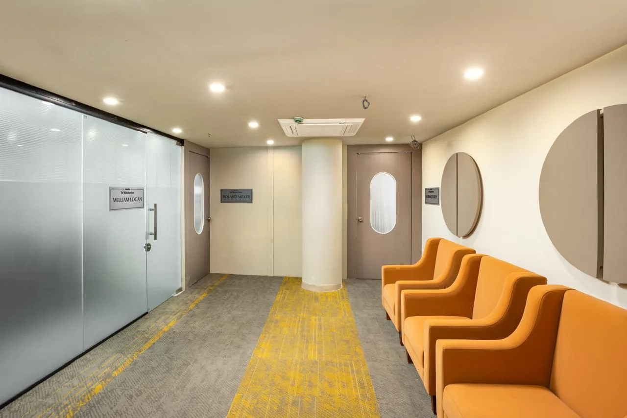 Hotel Explora Calicut hallway and guest area in Kozhikode